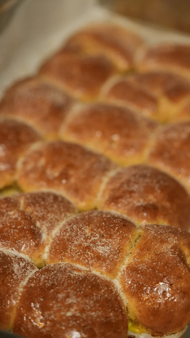 Fresh artisan bread with a golden crust at Maison Q.