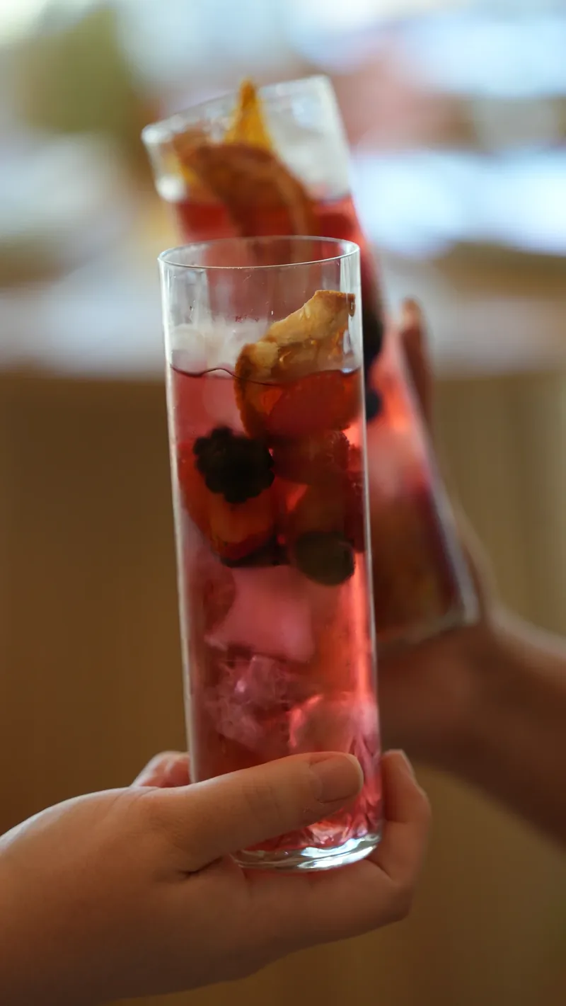 A refreshing iced fruit tea drink at Maison Q.